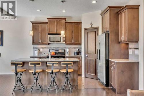 1544 Panatella Boulevard Nw, Calgary, AB - Indoor Photo Showing Kitchen