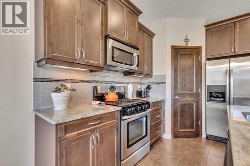 1544 Panatella Boulevard Nw, Calgary, AB - Indoor Photo Showing Kitchen