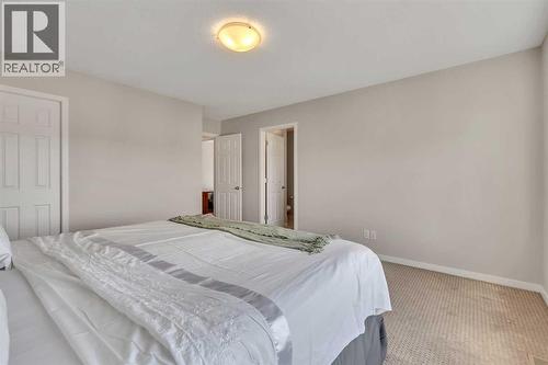 1544 Panatella Boulevard Nw, Calgary, AB - Indoor Photo Showing Bedroom