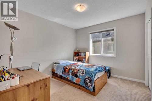 1544 Panatella Boulevard Nw, Calgary, AB - Indoor Photo Showing Bedroom