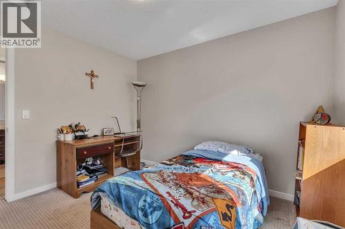 1544 Panatella Boulevard Nw, Calgary, AB - Indoor Photo Showing Bedroom