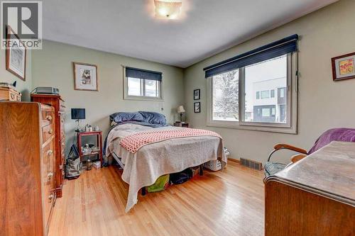 1455 Russell Road Ne, Calgary, AB - Indoor Photo Showing Bedroom