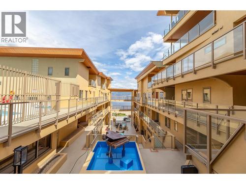 250 Marina Way Unit# 204, Penticton, BC - Outdoor With In Ground Pool With Exterior