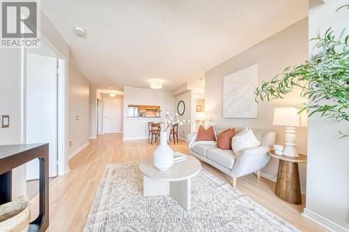 601 - 1200 The Esplanade Road N, Pickering, ON - Indoor Photo Showing Living Room With Fireplace
