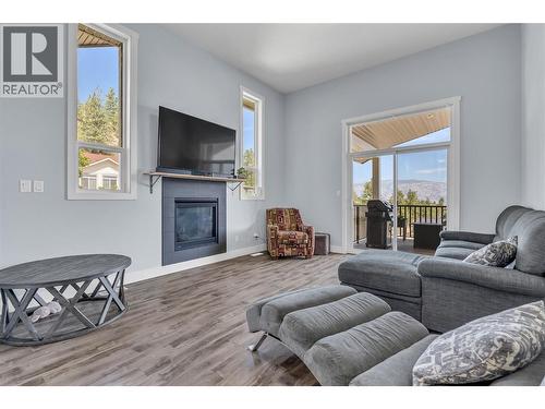14395 Herron Road Unit# 101, Summerland, BC - Indoor Photo Showing Living Room With Fireplace