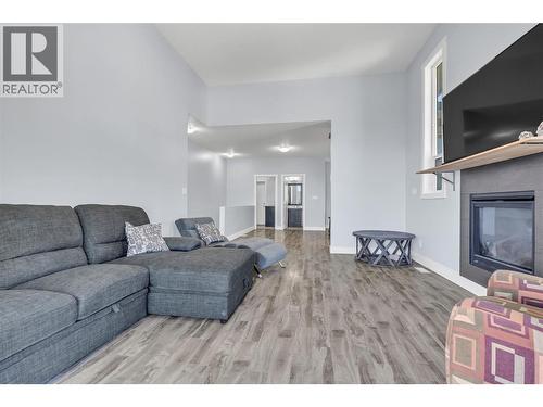 14395 Herron Road Unit# 101, Summerland, BC - Indoor Photo Showing Living Room With Fireplace