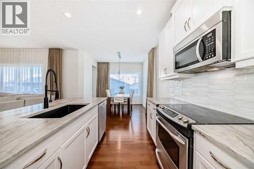 105 Elgin Meadows Circle Se, Calgary, AB - Indoor Photo Showing Kitchen With Upgraded Kitchen