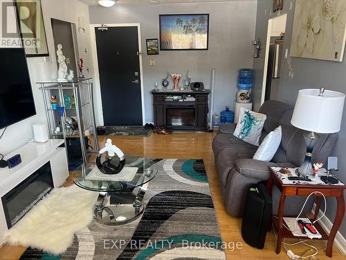 208 - 1660 Bloor Street, Mississauga, ON - Indoor Photo Showing Other Room With Fireplace