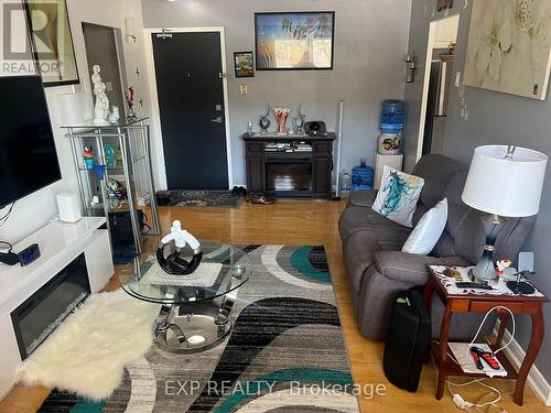208 - 1660 Bloor Street, Mississauga, ON - Indoor Photo Showing Living Room With Fireplace