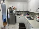 208 - 1660 Bloor Street, Mississauga, ON  - Indoor Photo Showing Kitchen With Double Sink 