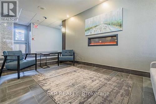 208 - 1660 Bloor Street, Mississauga, ON - Indoor Photo Showing Other Room With Fireplace
