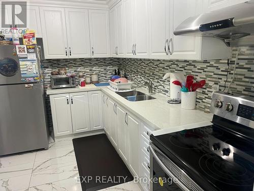 208 - 1660 Bloor Street, Mississauga, ON - Indoor Photo Showing Kitchen With Double Sink