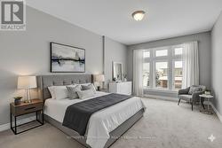 Virtually staged primary bedroom - 