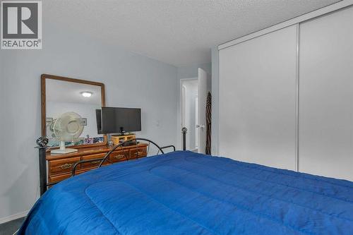 218 Pinemeadow Road Ne, Calgary, AB - Indoor Photo Showing Bedroom