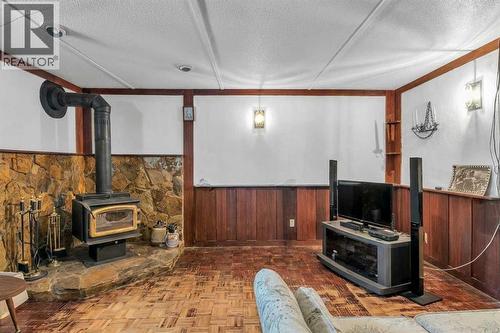 218 Pinemeadow Road Ne, Calgary, AB - Indoor With Fireplace