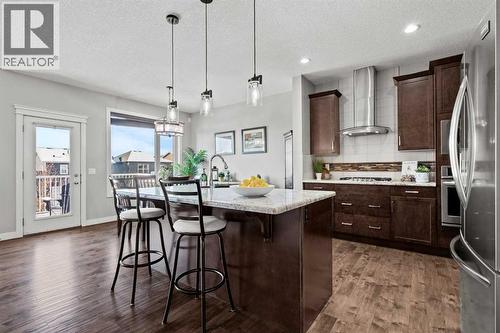 Stunning kitchen island - 69 Ravenskirk Close Se, Airdrie, AB - Indoor