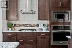 Gas cooktop, built-in oven and microwave - 