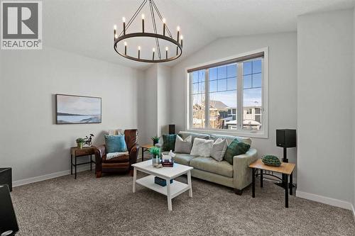 Vaulted ceilings in bonus room - 69 Ravenskirk Close Se, Airdrie, AB - Indoor Photo Showing Living Room