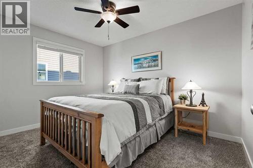 Bedroom 2 - 69 Ravenskirk Close Se, Airdrie, AB - Indoor Photo Showing Bedroom