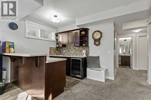 Stylish wet bar - 69 Ravenskirk Close Se, Airdrie, AB - Indoor