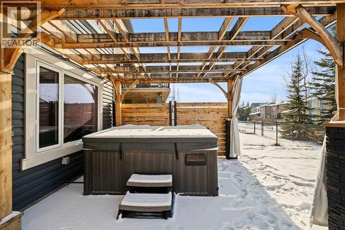 Hot tub under gazebo - 69 Ravenskirk Close Se, Airdrie, AB - Outdoor