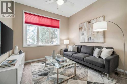 1113, 1113 Lake Fraser Green Se, Calgary, AB - Indoor Photo Showing Living Room