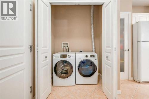 1113, 1113 Lake Fraser Green Se, Calgary, AB - Indoor Photo Showing Laundry Room