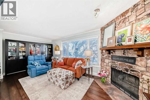 30 Edgewood Rise Nw, Calgary, AB - Indoor Photo Showing Living Room With Fireplace
