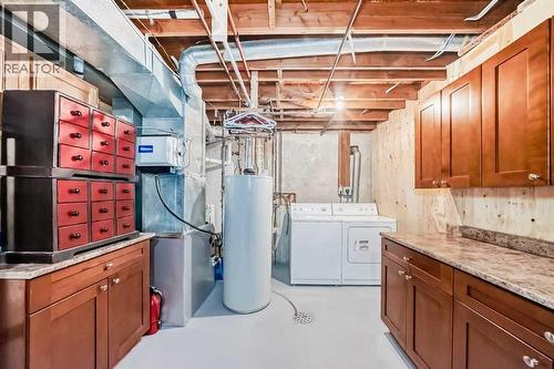 30 Edgewood Rise Nw, Calgary, AB - Indoor Photo Showing Laundry Room