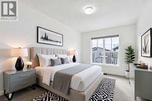 1124 Chinook Gate Bay Sw, Airdrie, AB - Indoor Photo Showing Bedroom