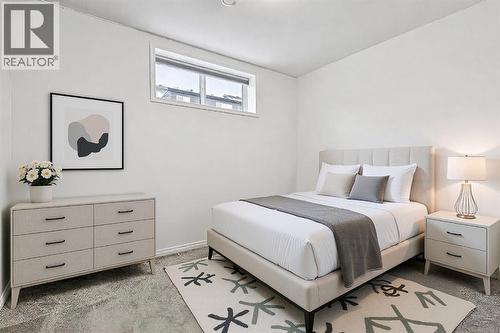 1124 Chinook Gate Bay Sw, Airdrie, AB - Indoor Photo Showing Bedroom
