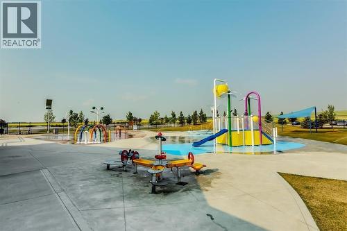 Splash Park at Chinook Winds Regional Park - 1124 Chinook Gate Bay Sw, Airdrie, AB - Outdoor With In Ground Pool