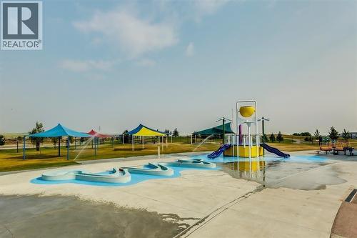 Splash Park at Chinook Winds Regional Park - 1124 Chinook Gate Bay Sw, Airdrie, AB - Outdoor With In Ground Pool