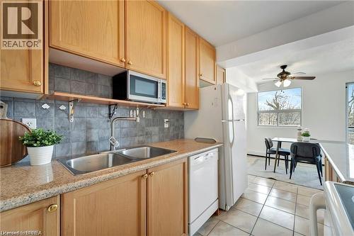 793 Colborne Street E Unit# 207, Brantford, ON - Indoor Photo Showing Kitchen With Double Sink