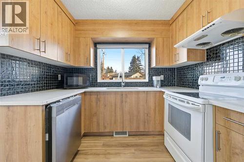 116 Falsby Road Ne, Calgary, AB - Indoor Photo Showing Kitchen