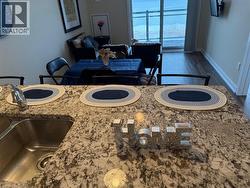 Living room featuring wood finished floors - 