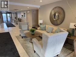 Lobby with recessed lighting and a wall of windows - 