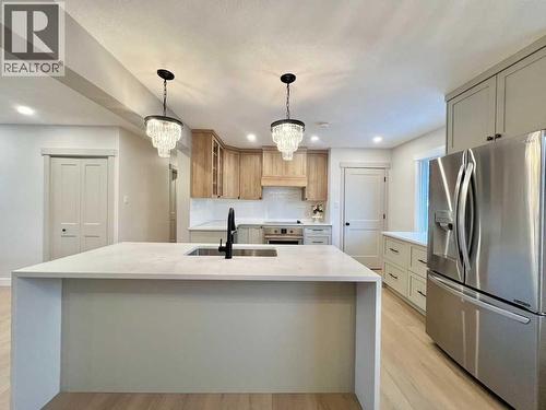 146 Springwood Drive Sw, Calgary, AB - Indoor Photo Showing Kitchen With Upgraded Kitchen