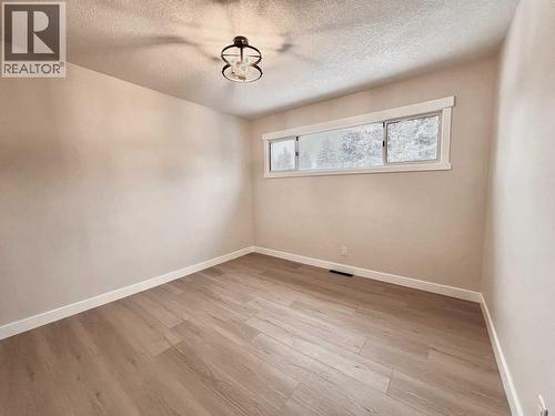 146 Springwood Drive Sw, Calgary, AB - Indoor Photo Showing Other Room