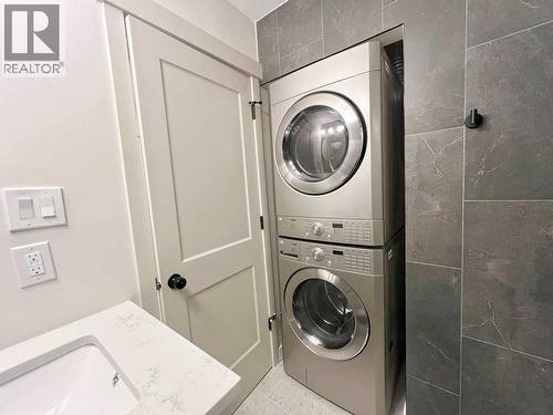 146 Springwood Drive Sw, Calgary, AB - Indoor Photo Showing Laundry Room