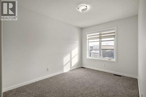 223 Savanna Way Ne, Calgary, AB - Indoor Photo Showing Other Room
