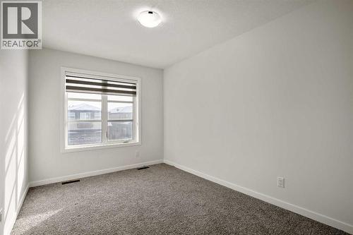 223 Savanna Way Ne, Calgary, AB - Indoor Photo Showing Other Room