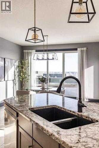 22 Palisades Lane Ne, Medicine Hat, AB - Indoor Photo Showing Kitchen With Double Sink With Upgraded Kitchen