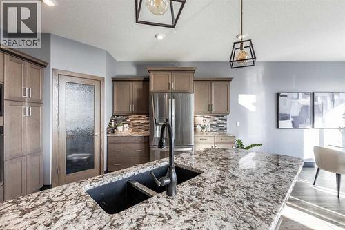 22 Palisades Lane Ne, Medicine Hat, AB - Indoor Photo Showing Kitchen With Double Sink With Upgraded Kitchen
