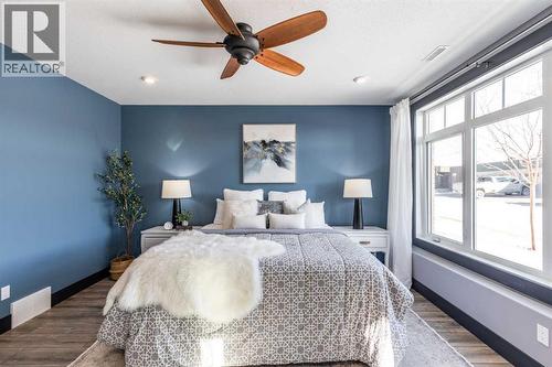 22 Palisades Lane Ne, Medicine Hat, AB - Indoor Photo Showing Bedroom