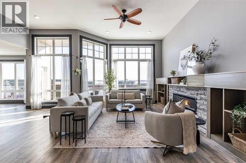 22 Palisades Lane Ne, Medicine Hat, AB - Indoor Photo Showing Living Room With Fireplace