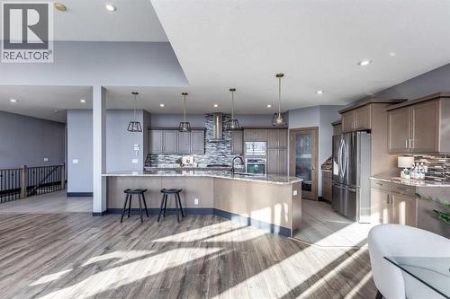 22 Palisades Lane Ne, Medicine Hat, AB - Indoor Photo Showing Kitchen With Upgraded Kitchen