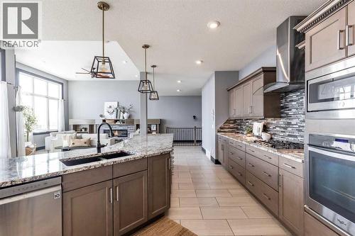 22 Palisades Lane Ne, Medicine Hat, AB - Indoor Photo Showing Kitchen With Double Sink With Upgraded Kitchen