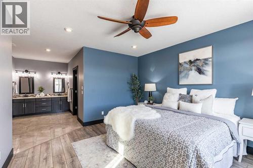 22 Palisades Lane Ne, Medicine Hat, AB - Indoor Photo Showing Bedroom