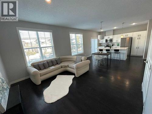 1101, 881 Sage Valley Boulevard Nw, Calgary, AB - Indoor Photo Showing Living Room